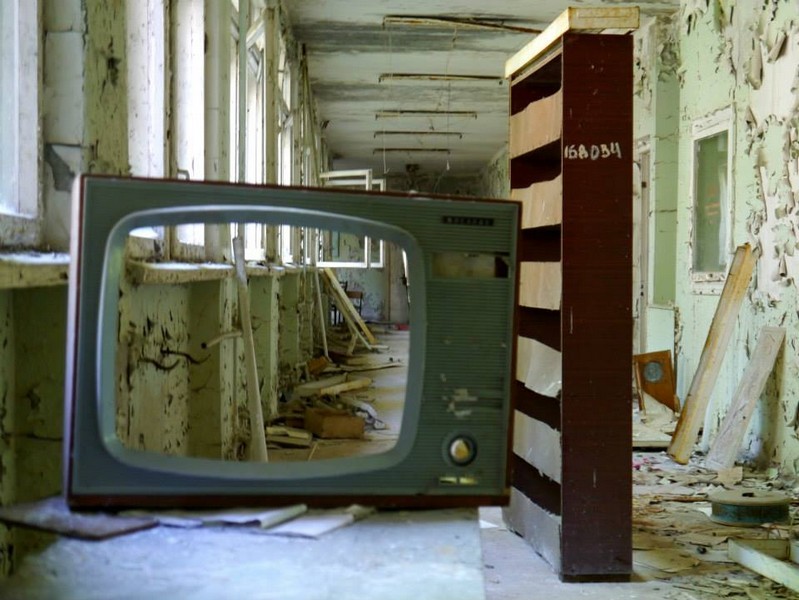 A TV and bookcase in Pripyat High School