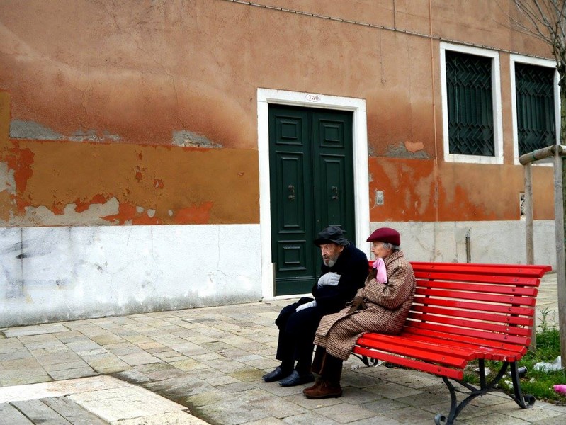 An old couple in winter in Venice
