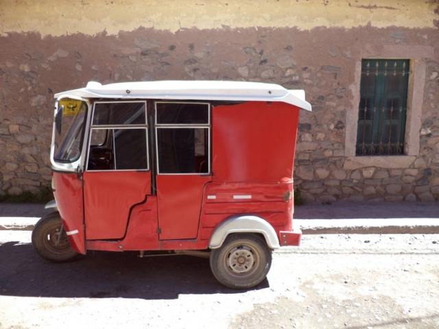 A red tuk tuk in Colombia