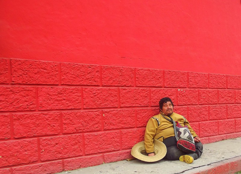 A Guatemalan man takes a well earned snooze on the street