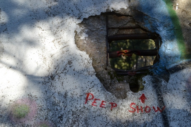 A hole in the abandoned bobsled track outside Sarajevo