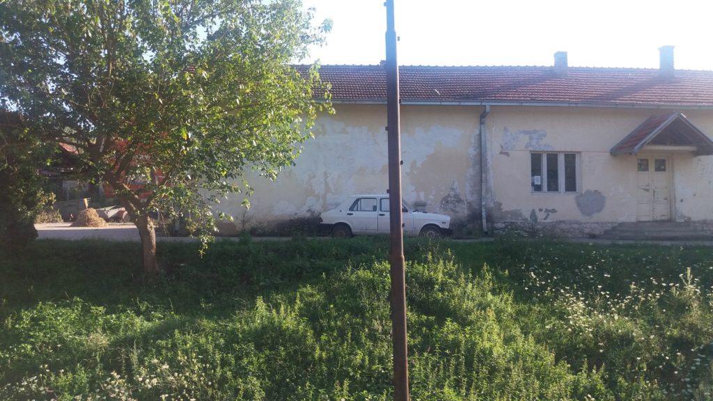 A car a house and a pole Belgrade to Sofia